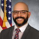 Man with beard and flag
